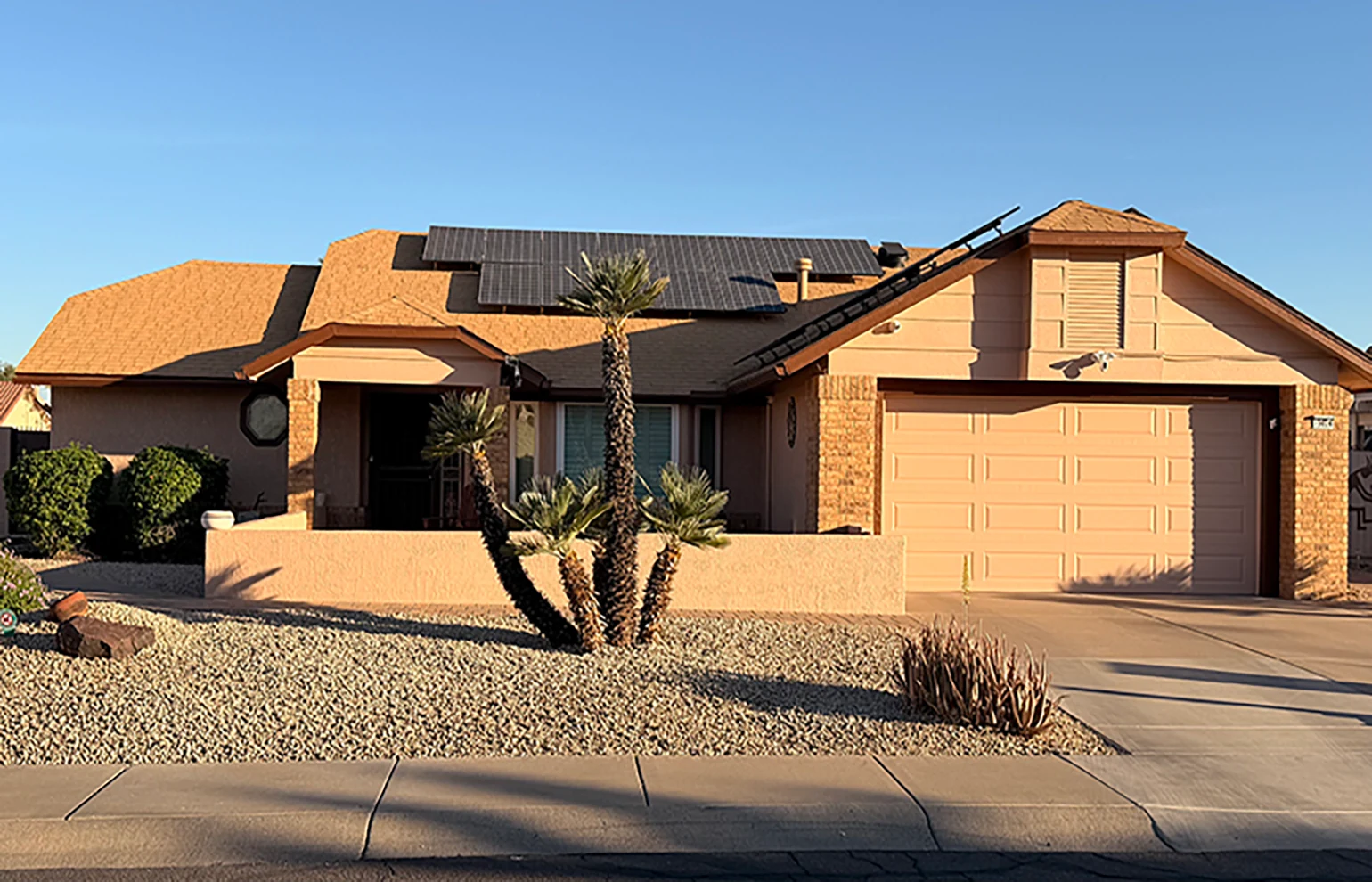 Freshly painted Sun City home exterior by Arizona's Quality Painting, residential painter in Sun City, AZ