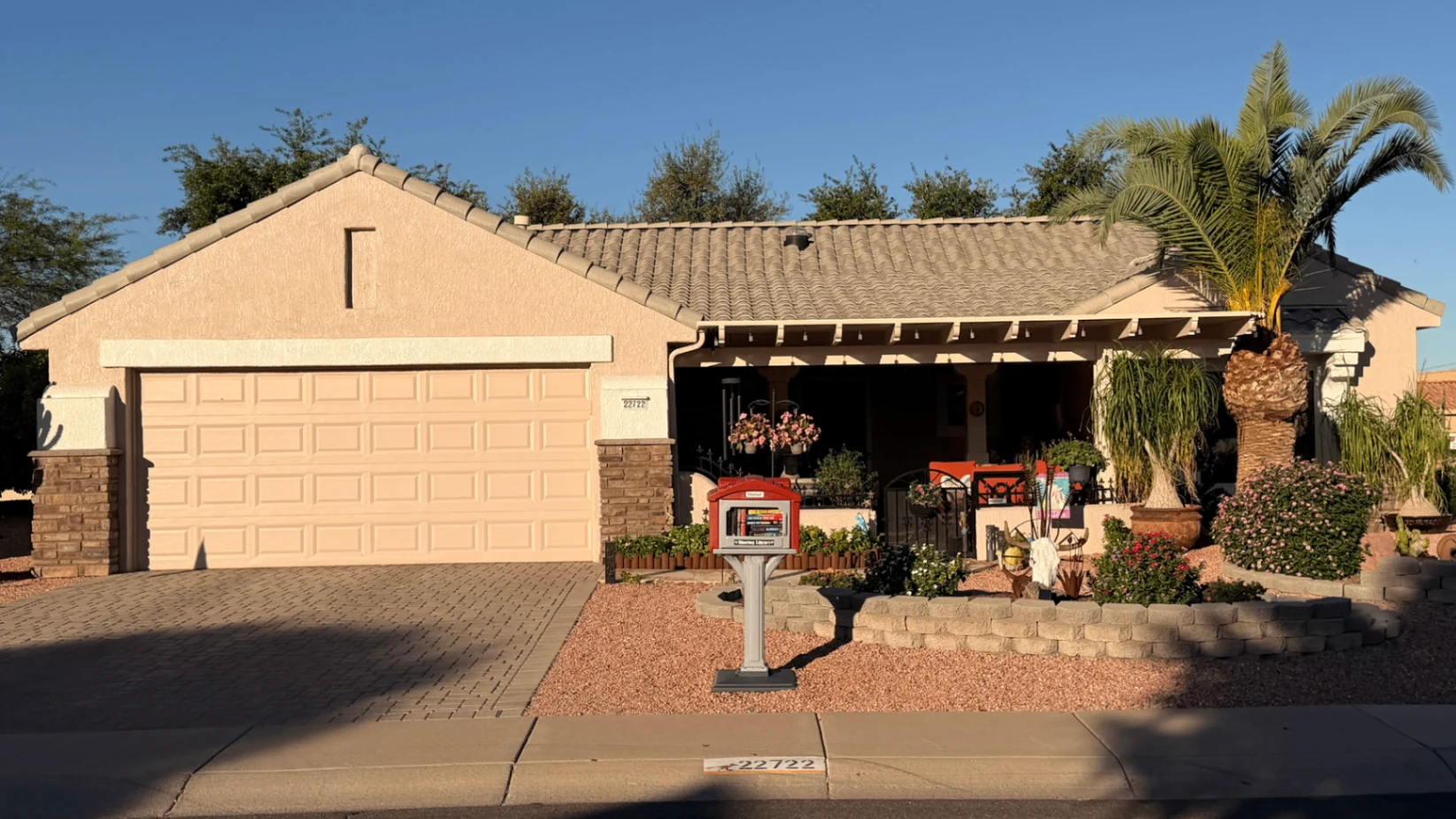 Two-tone stucco and trim exterior repaint with elastomeric coatings in Sun City, AZ
